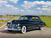 AUT 20 RK0453 01
1942 Cadillac Sedan Black 3/4 Front View On Road By Marsh