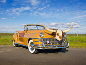 AUT 20 RK0460 01
1947 Chrysler Town & Country Tan Convertible With Longhorn Steer Head 3/4 Front View On Pavement