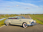 AUT 20 RK0466 01
1948 Buick Roadmaster Convertible Green 3/4 Side View On Road By Marsh