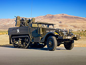 AUT 20 RK0548 01
1944 Anti-Aircraft Military Vehicle 3/4 Front View On Pavement In Desert