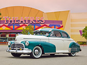 AUT 20 RK0556 01
1946 Chevrolet Fleetmaster White Pearl And Forest Green 3/4 Front View On Pavement By Movie Theater
