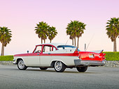 AUT 20 RK0565 01
1957 Dodge Custom Royal Lancer Red And White 3/4 Rear View On Pavement By Palm Trees