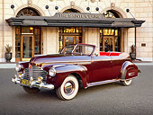 AUT 20 RK0592 01
1941 Buick Roadmaster Phaeton 71C Titan Maroon 3/4 Front View On Pavement By Front Of Hotel