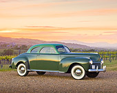 AUT 20 RK0599 01
1941 Chrysler C30 Saratoga Club Coupe Polo Green Light Over Dark 3/4 Side View On Gravel By Vineyard At Dusk