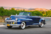 AUT 20 RK0621 01
1948 DeSoto Custom Regal Blue 3/4 Front View On Pavement By Vineyard