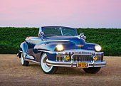AUT 20 RK0630 01
1948 DeSoto Custom Regal Blue 3/4 Front View On Grass By Vineyard At Dusk