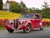 AUT 20 RK0639 01
1947 Delahaye 135M Red 3/4 Front View On Pavement By Autumn Vineyard And House
