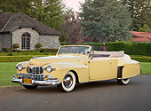 AUT 20 RK0642 01
1947 Lincoln Continental Yellow 3/4 Front View On Pavement By Houses