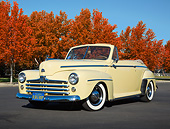 AUT 20 RK0649 01
1947 Ford Convertible Yellow 3/4 Front View On Pavement By Autumn Trees