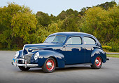 AUT 20 RK0657 01
1940 Mercury Tudor Dark Blue 3/4 Side View On Pavement By Trees