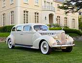 AUT 20 RK0665 01
1940 Packard 1805 7 Passenger Sedan Cream 3/4 Front View On Grass By Mansion