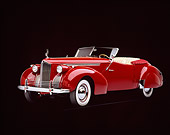 AUT 20 RK0026 04
1940 Packard Darrin Body Convertible Burgundy 3/4 Front View Studio
