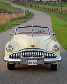 AUT 20 RK0084 02
1949 Buick Roadmaster Convertible Yellow Head On Shot On Pavement
