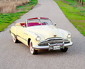 AUT 20 RK0086 01
1949 Buick Roadmaster Convertible Yellow 3/4 Front View On Road