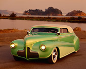 AUT 20 RK0095 01
1941 Ford Convertible Green Front 3/4 View On Pavement By Water Filtered