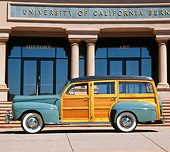 AUT 20 RK0148 05
1948 Ford Woody Green Side View On Pavement By Building