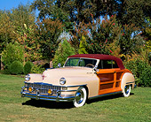 AUT 20 RK0152 02
1947 Chrysler Town & Country Convertible Beige 3/4 Front View On Grass By Trees