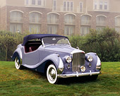 AUT 20 RK0248 02
1948 Bentley Convertible Periwinkle 3/4 Front View On Grass In Fog