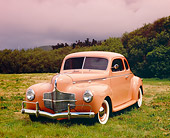AUT 20 RK0271 03
1940 Dodge Business Coupe Peach 3/4 Front View On Grass Filtered