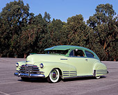 AUT 20 RK0295 01
1948 Chevrolet Fleetline Olive And Avacado Green 3/4 Front View On Pavement Trees Blue Sky