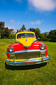 AUT 20 RK0306 01
1946 De Soto Taxi Cab Red And Yellow Head On View On Grass