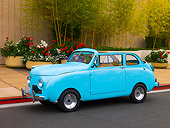 AUT 20 RK0309 01
1947 Crosley Convertible Aqua 3/4 Side View On Pavement By Flowers