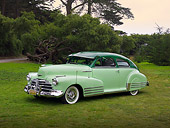 AUT 20 RK0316 01
1948 Chevrolet Fleetline Two Tone Green 3/4 Front View On Grass Trees Background