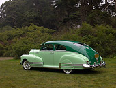 AUT 20 RK0321 01
1948 Chevrolet Fleetline Two Tone Green 3/4 Rear View On Grass Trees Background