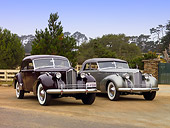 AUT 20 RK0325 01
1940 Packard Darrin Sedan Convertible Silver And Sport Sedan Burgundy Front 3/4 View On Dirt