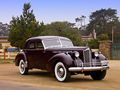 AUT 20 RK0327 01
1940 Packard Darrin Sport Sedan Burgundy Front 3/4 View On Dirt