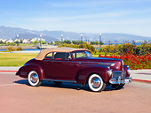 AUT 20 RK0354 01
1941 Hudson Commodore 8 Convertible Maroon 3/4 Front View By Water