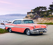 AUT 21 BK0016 01
1957 Pontiac Chieftain Coral And White 3/4 Front View On Pavement By Ocean