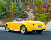 AUT 21 BK0025 01
1958 Austin-Healey Sprite (AKA Bugeye) Convertible Hot Rod Yellow 3/4 Rear View On Pavement By Park