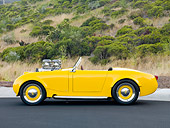 AUT 21 BK0028 01
1958 Austin-Healey Sprite (AKA Bugeye) Convertible Hot Rod Yellow Profile View On Pavement By Hills