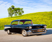 AUT 21 BK0036 01
1957 Chevrolet Bel Air Black 3/4 Front View On Pavement By Grassy Hill
