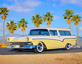 AUT 21 BK0052 01
1957 Ford Del Rio Ranch Wagon Yellow And White 3/4 Front View On Pavement By Palm Trees