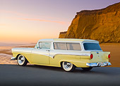 AUT 21 BK0056 01
1957 Ford Del Rio Ranch Wagon Yellow And White 3/4 Rear View On Pavement By Beach