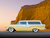 AUT 21 BK0057 01
1957 Ford Del Rio Ranch Wagon Yellow And White Profile View On Pavement By Beach