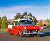 AUT 21 RK0076 02
1955 Chevy Bel Air Red And White 3/4 Front View In Parking Lot By Trees And Blue Sky