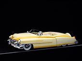 AUT 21 RK0150 10
1953 Cadillac Eldorado Convertible Yellow 3/4 Side On Gray Line Headlights On Studio Background