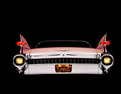 AUT 21 RK0262 03
1959 Pink Cadillac DeVille Low Rear View Lights On Studio Background