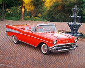 AUT 21 RK0551 01
1957 Chevy Bel Air Convertible Red 3/4 front high angle on brick driveway with water fountain