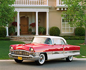 AUT 21 RK0556 14
1956 Red/White Packard 400, 3/4 front on road with house in background