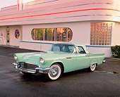 AUT 21 RK1351 04
1957 Ford Thunderbird Hardtop Green 3/4 Front View On Pavement By Diner