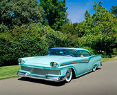 AUT 21 RK1642 02
1957 Ford Fairlane Custom Light Blue 3/4 Front View On Pavement By Trees