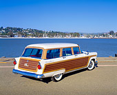 AUT 21 RK1716 01
1955 Ford Woody Wagon White Rear 3/4 View On Pavement By Water