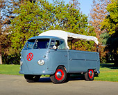 AUT 21 RK1723 04
1956 Volkswagen Single Cab Pick Up Gray And Red 3/4 Front View On Pavement By Grass And Trees