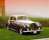 AUT 21 RK1780 02
1958 Bentley Saloon S1 Silver And Gray 3/4 Front View On Grass In Fog