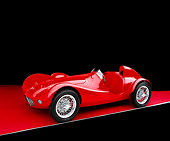 AUT 21 RK1822 05
1953 Giaur Champion Red 3/4 Side View On Red Floor Studio