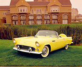 AUT 21 RK1880 02
1956 Ford Thunderbird Convertible Yellow 3/4 Front View On Grass By Mansion